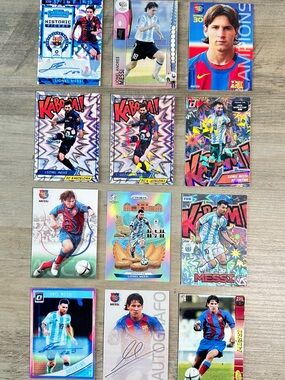 Lionel Messi Signed Rookie Lot of (12) Panini Kaboom Prizm Novelty Cards.
